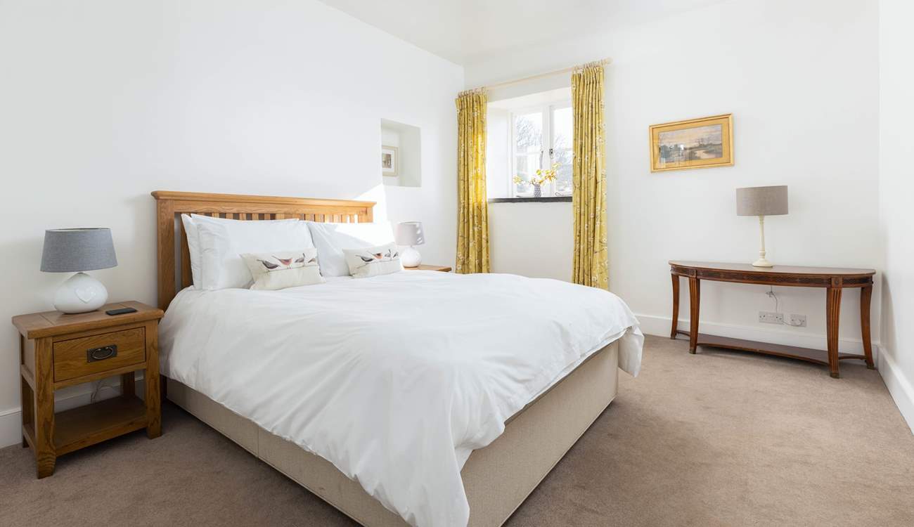 Bedroom 1 offers this king-size bed on the ground floor.