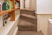 This is an old cottage and there is a slight curve to the final few stairs up to the twin bedroom.