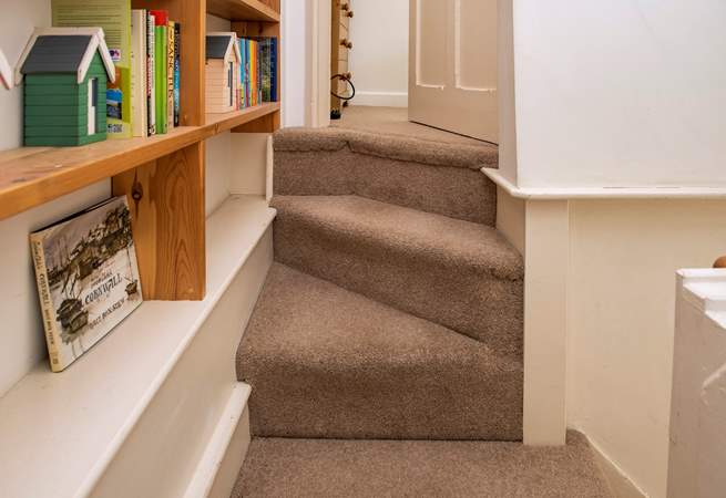 This is an old cottage and there is a slight curve to the final few stairs up to the twin bedroom.