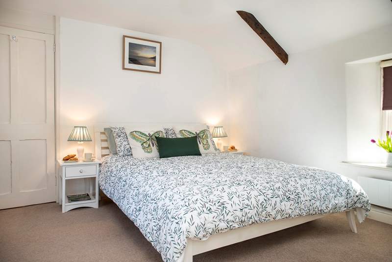 Lovely bedroom 1 comes with a super-comfy king-size bed.