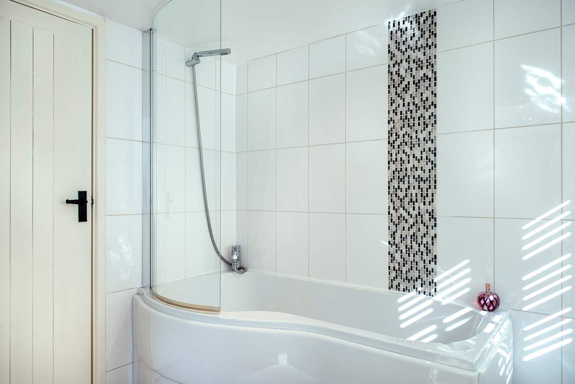 Indulge yourself with a leisurely holiday soak in the family bathroom.