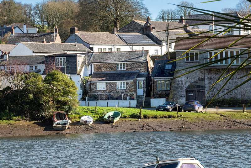 Your riverside holiday home is waiting to welcome you (Tansy is in the centre of the picture - the cottage with the white door).