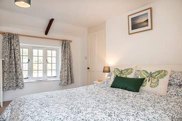Lovely linens adorn the bed.
