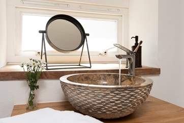 The marble counter top sink is another charming feature.