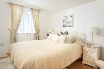 The three bedrooms are individually styled.