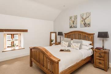 The main bedroom located on the first floor.