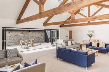 As you would expect in such a fabulous house, there is plenty of space for relaxing. The more formal lounge to the front of the house is magnificent with a wood-burner.