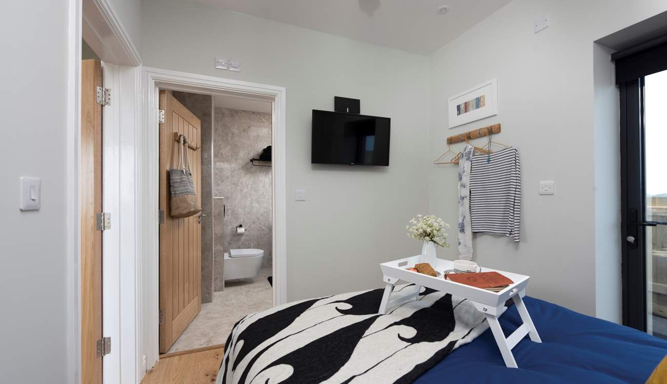 TV in bed - well you are on holiday. There are hooks for your clothes and further storage under the mattress.