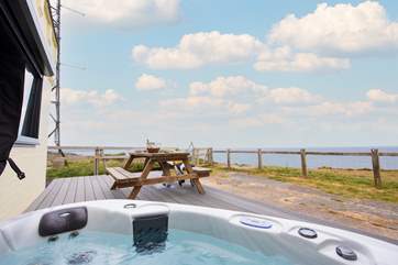 Treat yourself to relaxing soak in the hot tub.
