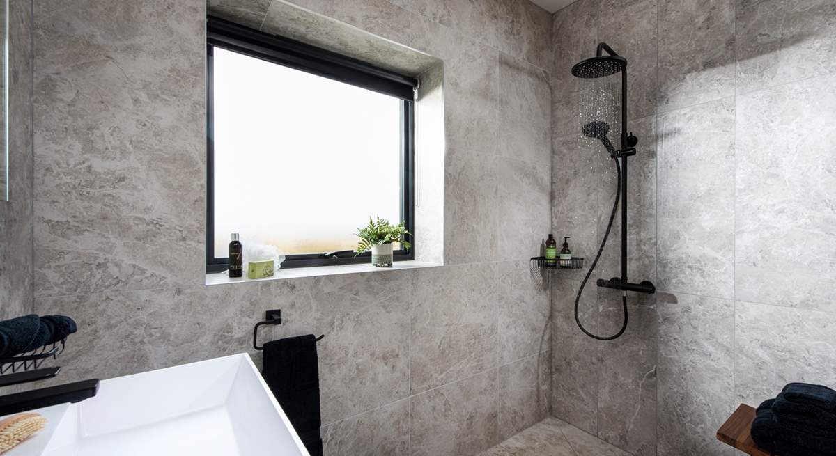 The spacious wet-room is incredibly stylish.