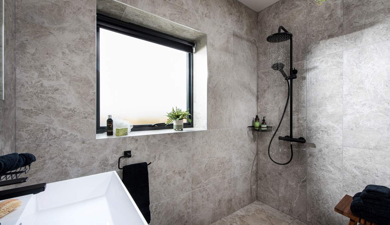 The spacious wet-room is incredibly stylish.