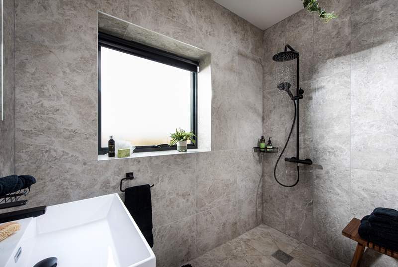 The spacious wet-room is incredibly stylish.