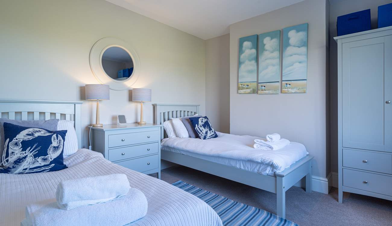 Pretty twin room with views towards the lighthouse and out to sea.