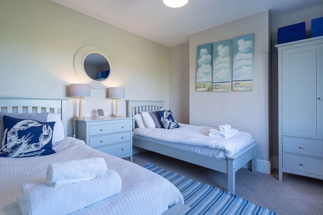 Pretty twin room with views towards the lighthouse and out to sea.