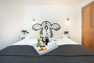 The sumptuous bed offers a blissful nights sleep.