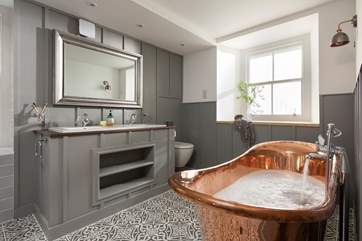 We simply love the free-standing bath and twin sinks.