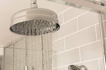 The gorgeous drench head shower will set you up for the day.