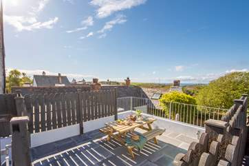 The sunny terrace is the perfect spot for whiling away many a lazy afternoon.