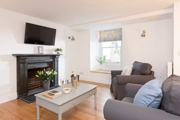 There's plenty of space to relax whether watching a film together or curled up with a good book.