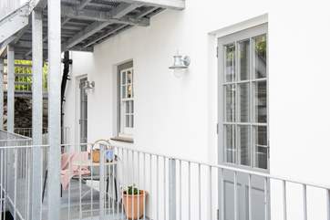 There's a place to sit outside the bedroom doors, which then leads you to your own private terrace