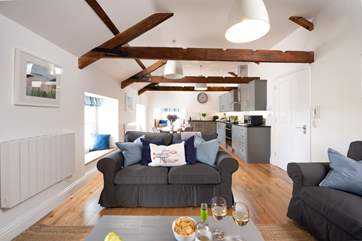 The stylish open plan living-room will ensure you enjoy many happy holiday memories together.