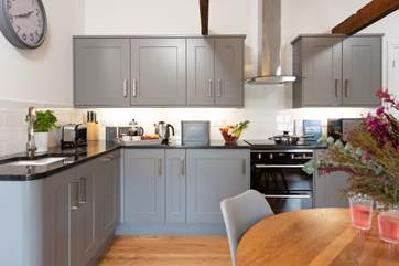 The soft grey palette throughout makes for a very chic interior.