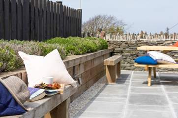 The sunny terrace beckons you to enjoy your meals out in the fresh air.