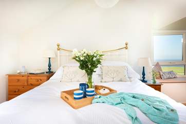 A gorgeous king-size bed awaits you in bedroom two.