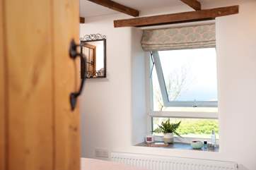 Let's take a peek inside bedroom one.