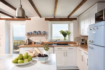 Washing up will be a pleasure with those views!