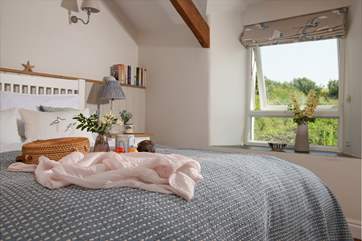 Bedroom three is dual aspect so you can enjoy sea views on one side and the countryside on the other.