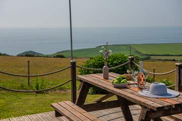 At the end of the day watch the sunset as you enjoy meals on the higher decking area just outside the kitchen