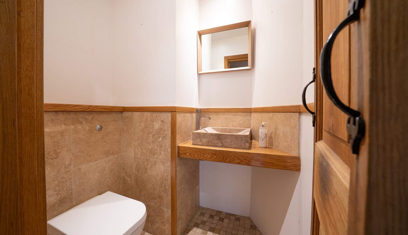 There is a WC and wash-basin on the ground floor.