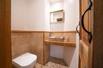 There is a WC and wash-basin on the ground floor.