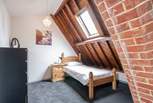 ...also offering a single bed which can be accessed through a second door although sharing the same room space. Please note there're no blinds in the first floor bedroom skylights.