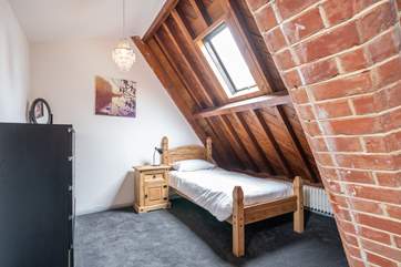 ...also offering a single bed which can be accessed through a second door although sharing the same room space.