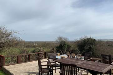A decked area provides seating for you to enjoy a glass of your favourite drink while admiring the views and horses in the surrounding fields.