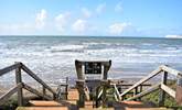 Spend a day on the beach at Compton Bay, a dog-friendly beach on one side only. - Thumbnail Image