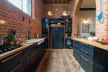 The modern style kitchen adapts well with the historic building.