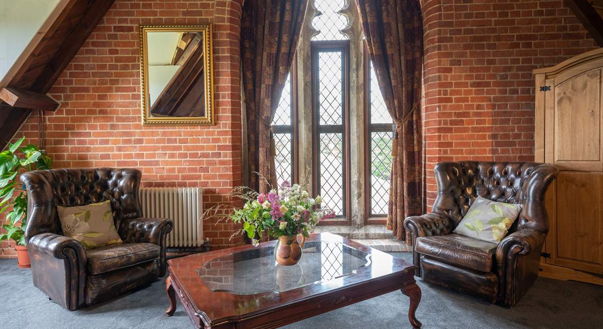 The seating area in Bedroom 6.