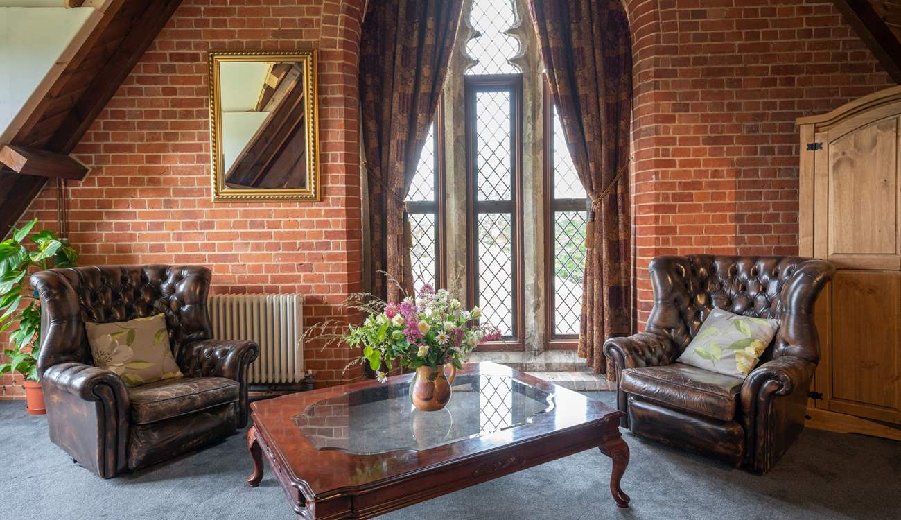 The seating area in Bedroom 6.
