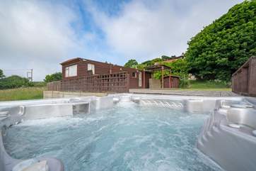 The hot tub and decking area is a fabulous spot to relax.
