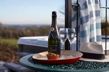 Enjoy the use of the hot tub and the fantastic views!