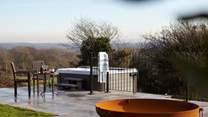 The hot tub and decking area is a fabulous spot to relax with gorgeous views.