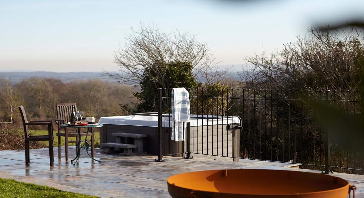 The hot tub and decking area is a fabulous spot to relax with gorgeous views.