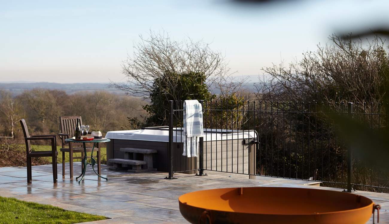 The hot tub and decking area is a fabulous spot to relax with gorgeous views.