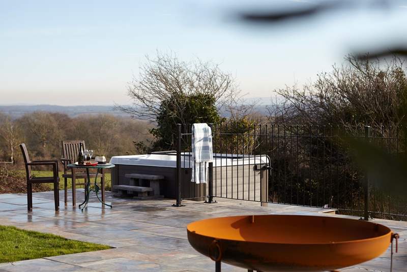 The hot tub and decking area is a fabulous spot to relax with gorgeous views.