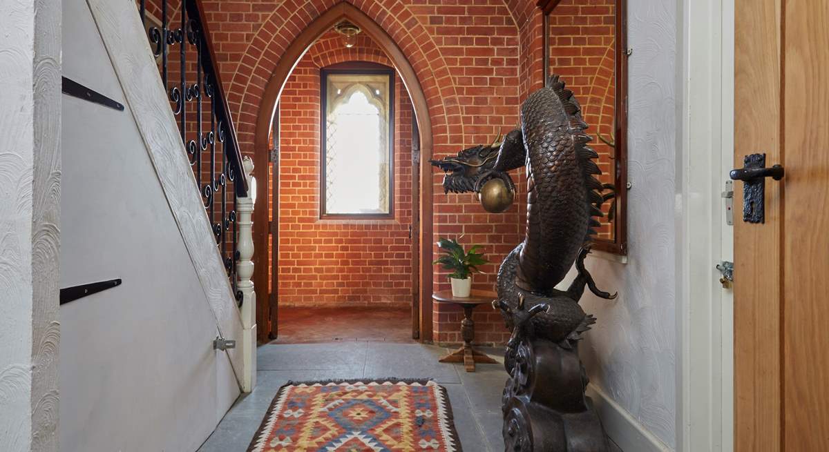 Welcome to St Andrews.  The Dragon sculpture in the hallway is full of character.