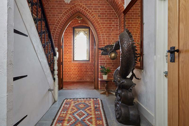 Welcome to St Andrews.  The Dragon sculpture in the hallway is full of character.