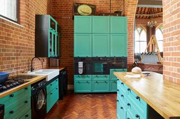 The modern style kitchen adapts well with the historic building.